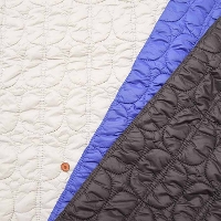 Made in China Polyester Reversible Puffy Quilt Fabric Quatre